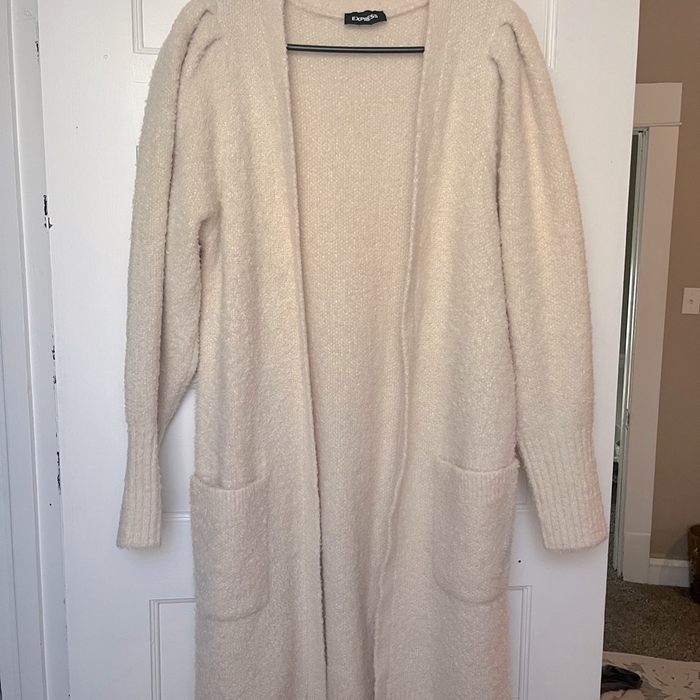 Express puff shoulder cardigan.